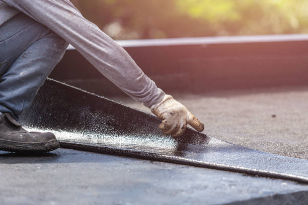 Professional Waterproofing technician working in Riverview, MI